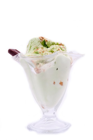 ice cream in a cup of chocolate on a white backgroundの写真素材