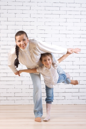 Mom and daughter are doing swallowの写真素材