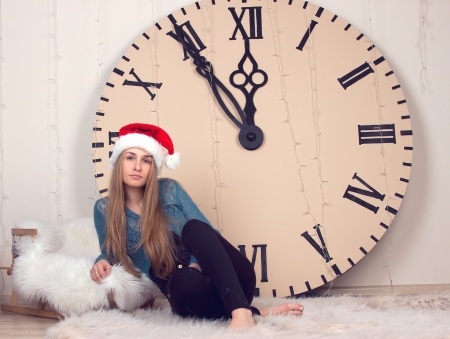 beautiful girl on clocks background lunch timeの写真素材