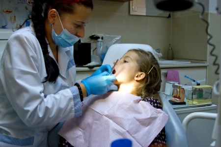 a girl at the dentist.の写真素材