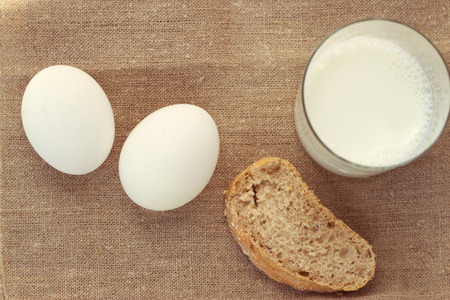 still life with Fresh bread and egg, milkの写真素材