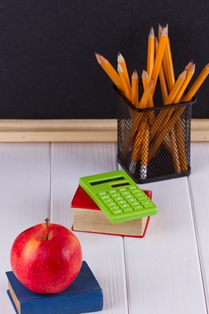 The School supplies on white wooden tableの写真素材