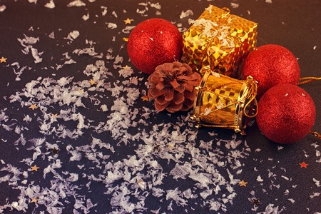 Christmas decorative gift box, ball on black background
