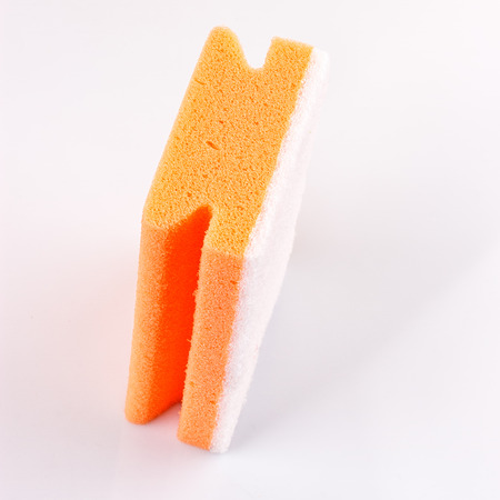 colored sponges close up cleaners, detergents, household cleaning sponge for cleaning on white backgroundの写真素材