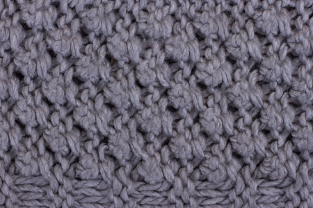 Gray knitting background texture. Knit woolen Fabric textileの写真素材