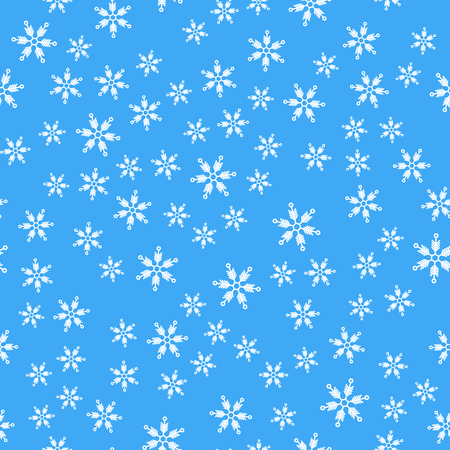 Seamless pattern. White snowflakes on a blue backgrounds. For packaging paperの写真素材