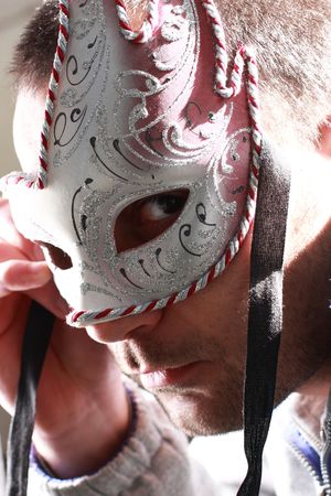 man with carnival mask close upの写真素材