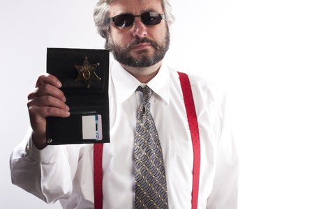 Police officer show identification badgeの写真素材