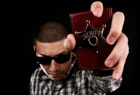 Police officer show identification badge