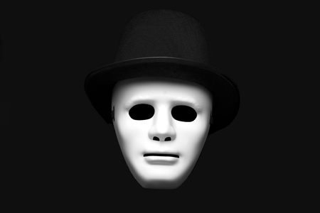 White mask in cylinder hatの写真素材