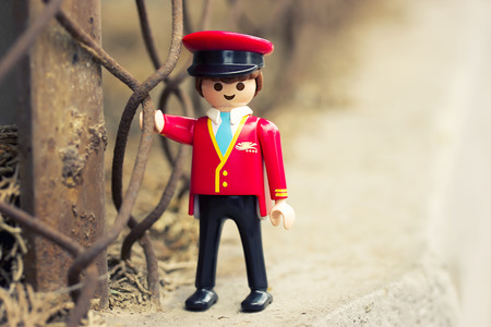 Miniature plastic toy. Man in the form of a passengerの写真素材