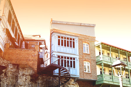 Houses on a cliff in old town in Tbilisi, Georgiaの写真素材