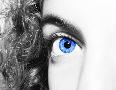 Beautiful insightful look blue eyesの写真素材