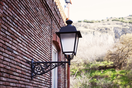 Traditional forged iron lamp on the street of Kalaubani area in Old Tbilisiの写真素材