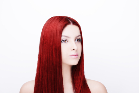 Beautiful Girl with Healthy Long Hair. Isolated on whiteの写真素材