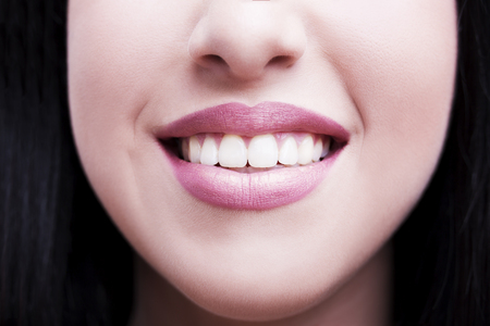 closeup of smile with white healthy teethの写真素材