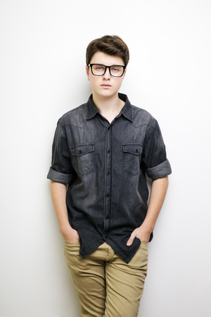 Stylish handsome young man posing. Studio shot on white backgroundの写真素材