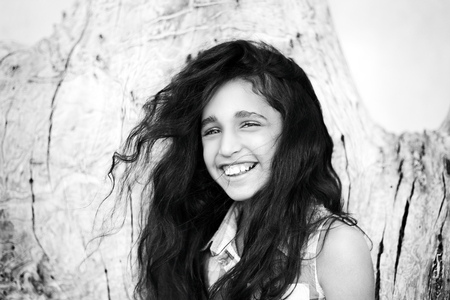 Portrait of a smiling charming africanian little girlの写真素材