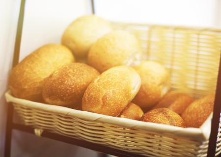 Pies in a wicker basket on light background. Traditional Homemade Pattiesの写真素材