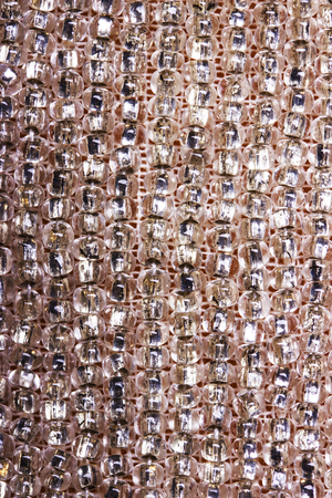 Close-up backdrop with tiny glass seed beads. High resolution photo.の写真素材