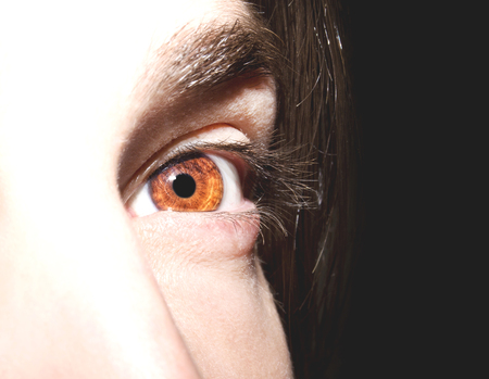 Image of man's brown eye close up.の写真素材