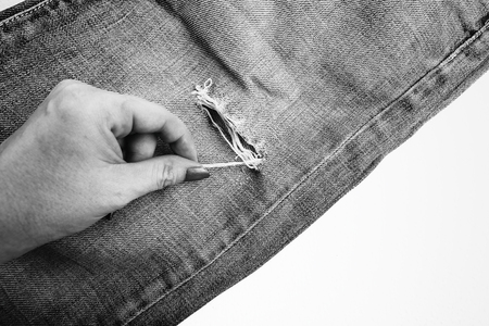 Denim Jeans Background With Seam of Jeans Fashion Design. Stitched Texture Denim Jeans Background of...