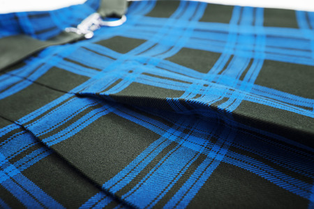 Short plaid skirt isolated on white background
