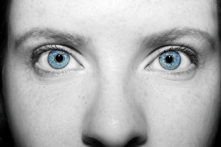 A beautiful insightful look woman's eyes. Close up shotの写真素材