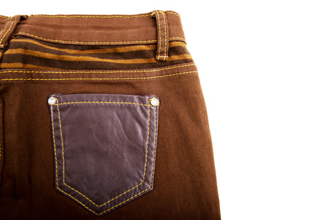 Brown women's casual pants isolated on white background. Leather insertsの写真素材