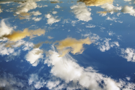 Blue sky background with clouds . Sky with cloudsの写真素材