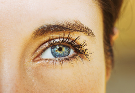A beautiful insightful look woman's eye. Close upの写真素材