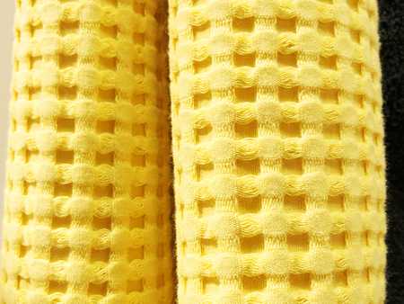 Top view of cloth textile surface. Knitted fabric texture.