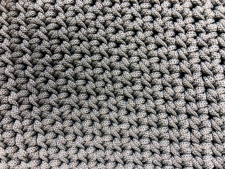 Top view of cloth textile surface. Knitted fabric texture.