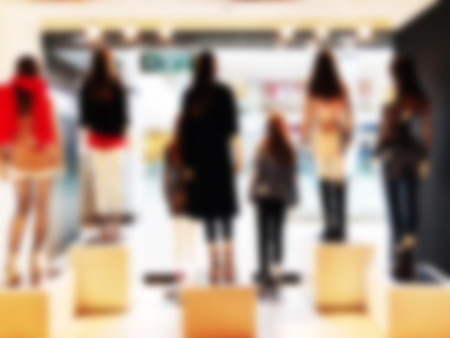Blurred mannequins in a clothing shop in shopping mall. Abstract blurred backgroundの写真素材