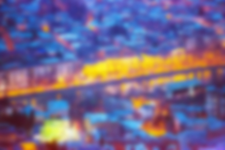 City lights bokeh blur effect at night. Unfocused blurred urban abstract backgroundの写真素材