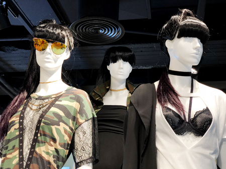 Clothes on a mannequins in a shop. Shopping mallの写真素材