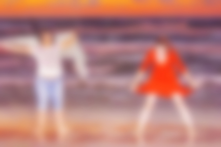 Abstract blurred background. Vacation and fun on the beach. Blurred peopleの写真素材