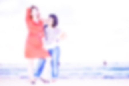 Abstract blurred background. Vacation and fun on the beach. Blurred peopleの写真素材
