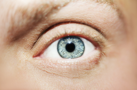 Image of man's beautiful insightful look eye close up. Focus on eyes.の写真素材