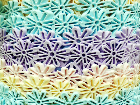 plastic flower holders outside the store. Background of flower stand for flowersの写真素材