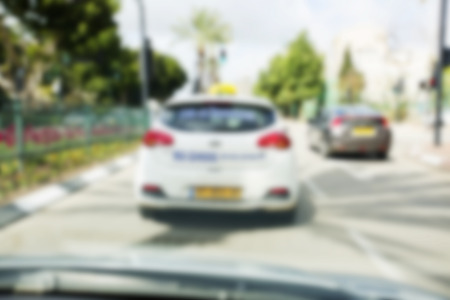 Abstract blurred background. Blurred road with car running.の写真素材