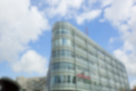 Abstract blurred background. Blurred  large buildings in the background.の写真素材
