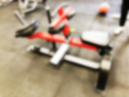 Training apparatus in gym. Blurred picture of gym. The abstract blur fitness gym background