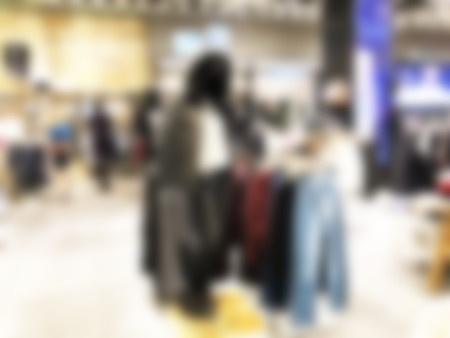 Blurred mannequins in a clothing shop in shopping mall. Abstract blurred backgroundの写真素材