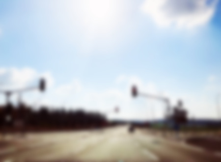 Abstract blurred background. Blurred road with car running
