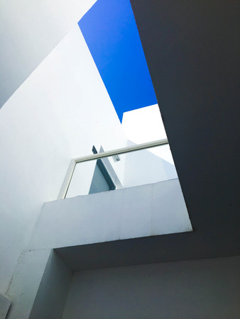 Traditional white architecture blue sky in Nahariya, Israel