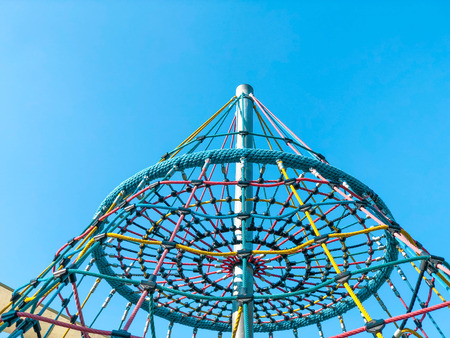 Children's leisure, entertainment outdoors in the park. A colorful playground.