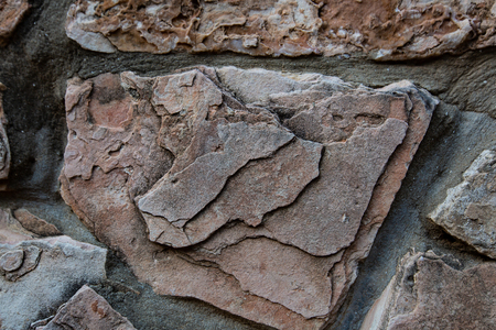 Close up of natural stone wall. Stone wall texture.の写真素材