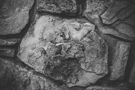 Close up of natural stone wall. Stone wall texture.の写真素材