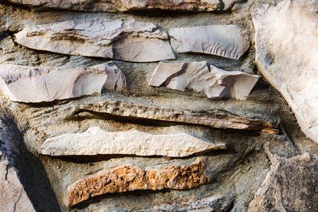 Close up of natural stone wall. Stone wall texture.